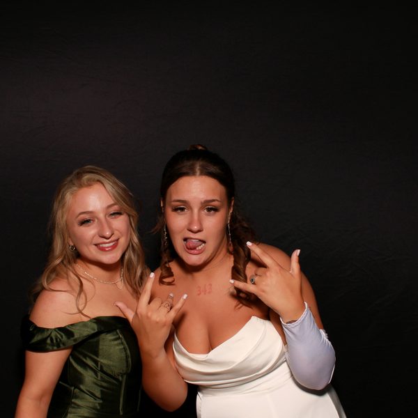 Bride and friends enjoying the photo booth